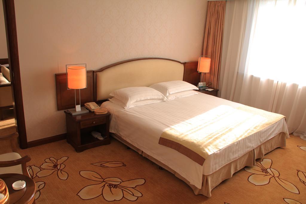 Harbin Victories Hotel Chambre photo